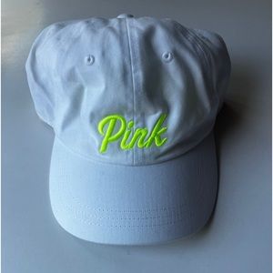 Pink hat with neon yellow letters